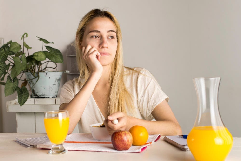 girl having eating difficulties.