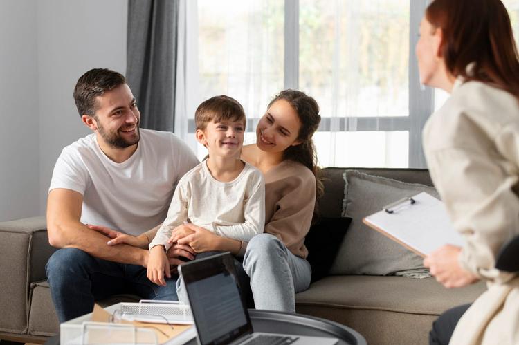 Close up family discussing with therapist - Family Therapy (Family-Focused Therapy)