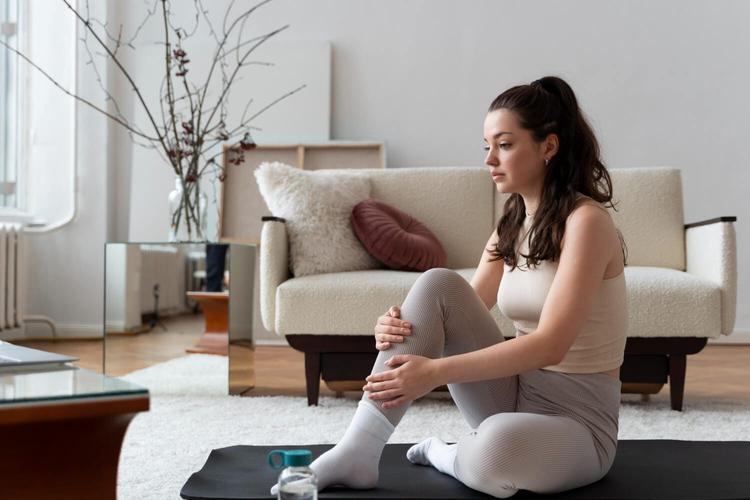 Mentally Ill Woman working out after online fitness instructor is still sad and in pain