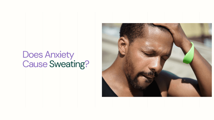 young bearded man is wiping his sweat - Does Anxiety Cause Sweating?